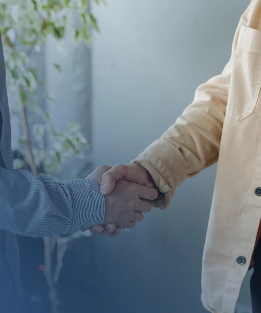 Attorney shaking hands with a client