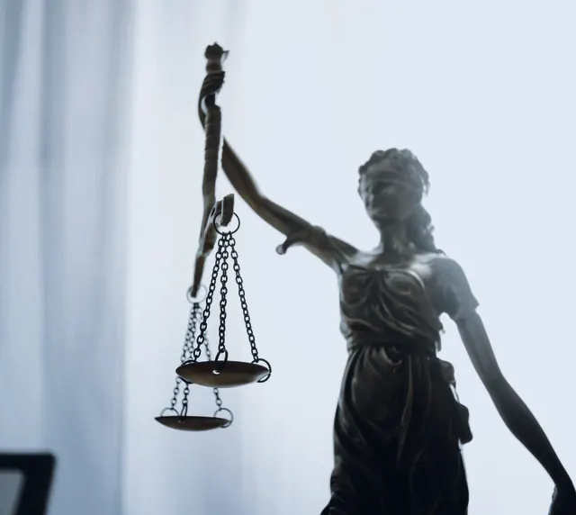 Lady Justice statue holding scales